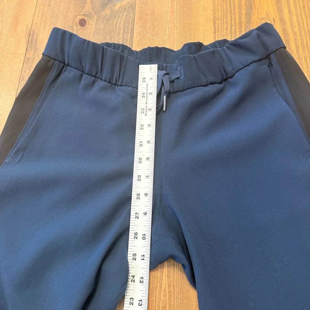 Lululemon Women's On The Fly Straight Leg Pants Size 6‎ Navy Blue Leg Stripe